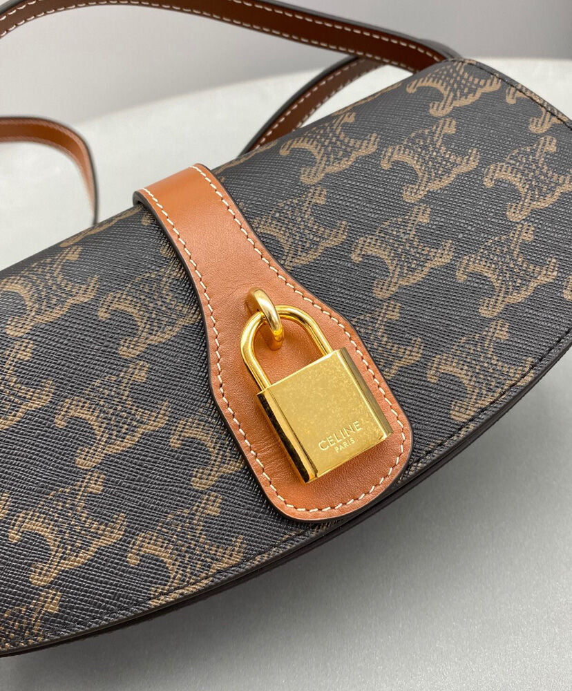 Clutch On Strap In Triomphe Canvas And Calfskin