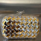 Knot Minaudiere Clutch in Laminated Intreccio Leather