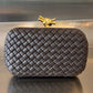 Knot Padded Intrecciato Leather Clutch