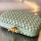 Knot Padded Intrecciato Leather Clutch