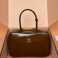 Beau Naplak Patent Leather Bag