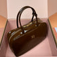 Beau Naplak Patent Leather Bag