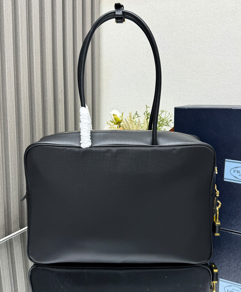 Large Re-Nylon And Leather Top-handle Bag With Padlock