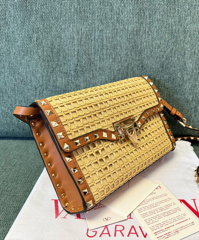 Small Rockstud Shoulder Bag In Woven Raffia