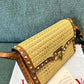 Small Rockstud Shoulder Bag In Woven Raffia