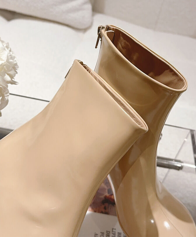 Atomic Glossed-Leather Ankle Boots