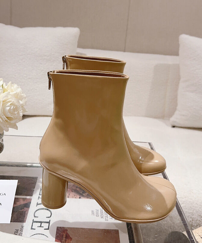 Atomic Glossed-Leather Ankle Boots