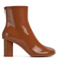 Atomic Glossed-Leather Ankle Boots