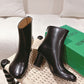 Atomic Glossed-Leather Ankle Boots