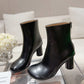 Atomic Glossed-Leather Ankle Boots