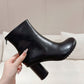 Atomic Glossed-Leather Ankle Boots