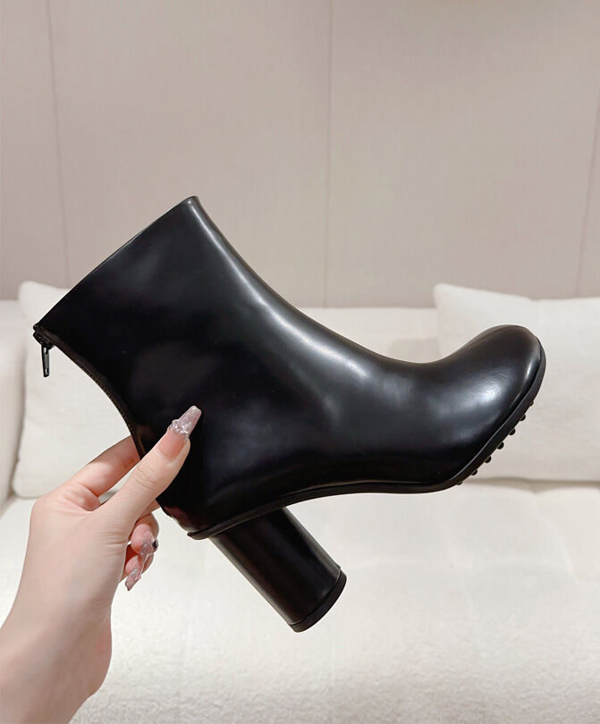 Atomic Glossed-Leather Ankle Boots