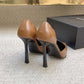 D'Orsay Glossed-Leather Pumps