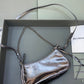 Le Cagole Mini Leather Shoulder Bag