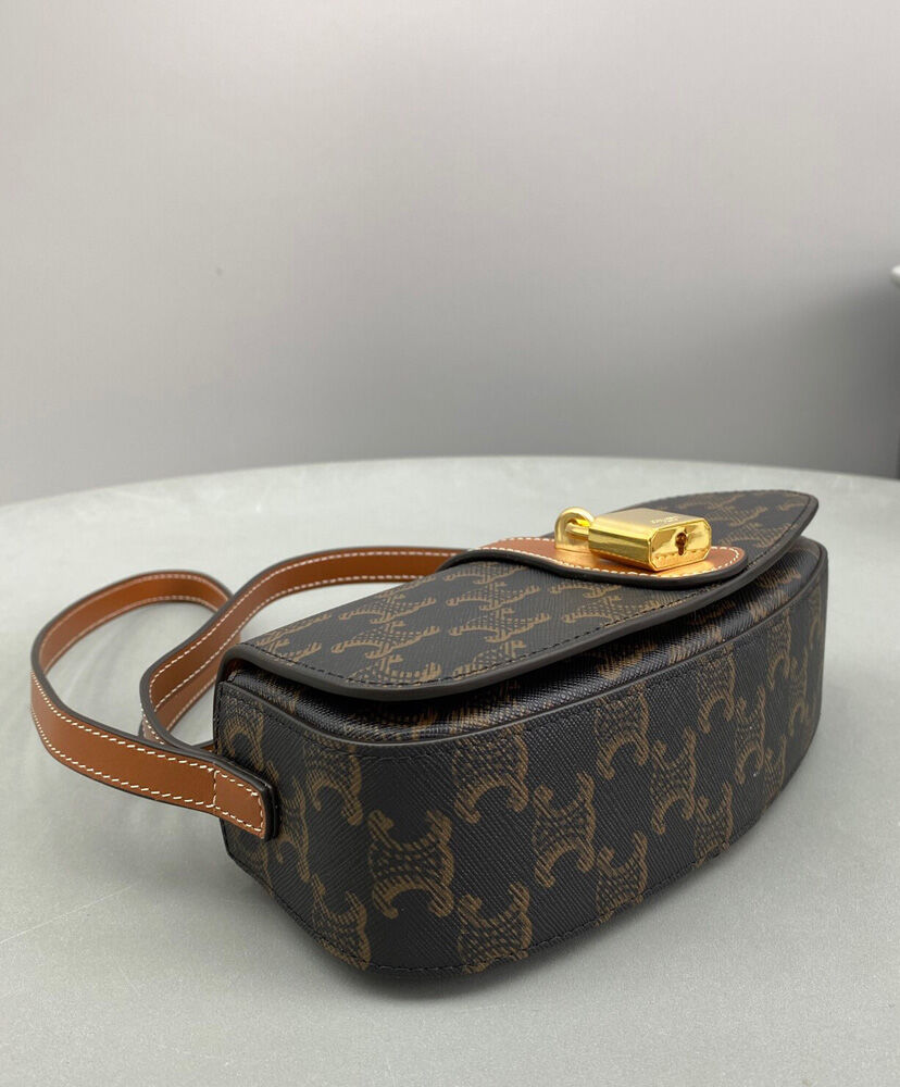 Clutch On Strap In Triomphe Canvas And Calfskin