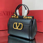 Valentino Garavani Small Rockstud Alcove Top-Handle Bag