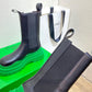 Tire Rubber-trimmed Leather Chelsea Boots